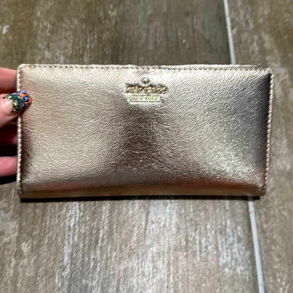 kate spade Handbags - Kate Spade Metallic Cameron Saffiano Leather Rose Gold wallet.